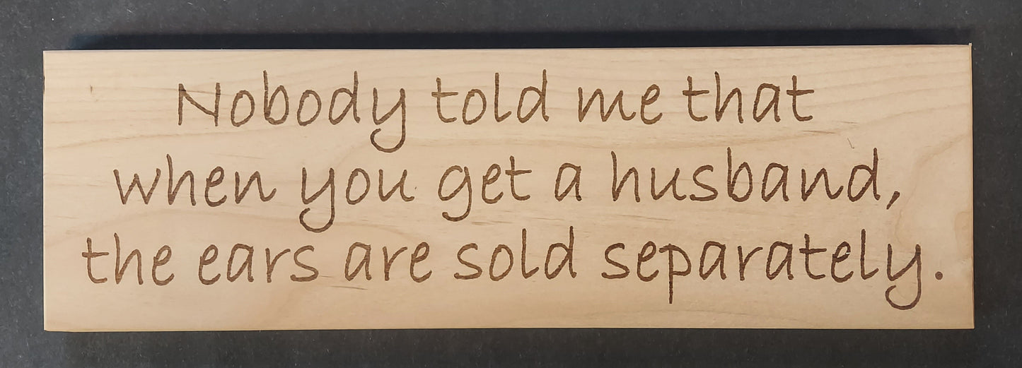 Sign - "EARS SOLD SEPARATELY"