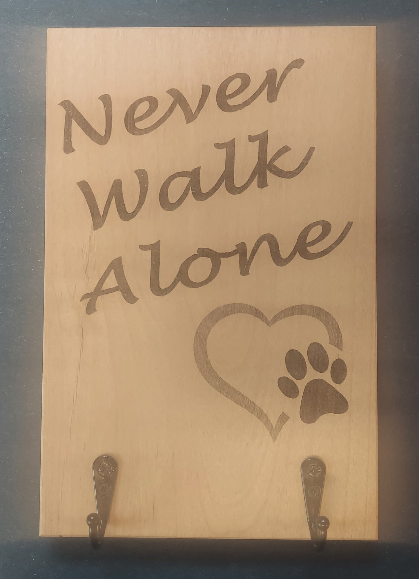 Sign - "NEVER WALK ALONE"